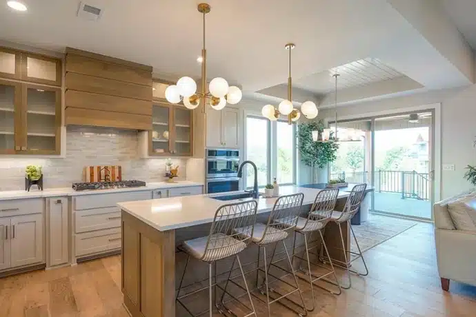 kitchen in woodland trails with large island with stools - big open concept space
