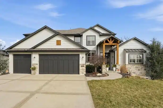 front view of modern home in woodland trails